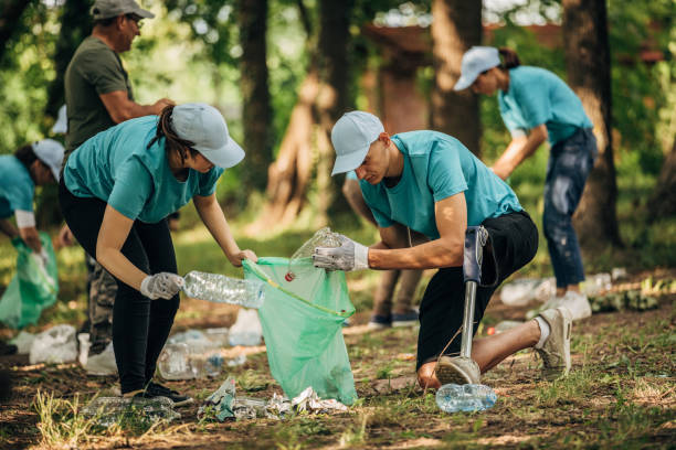 istock Volunteers cleaning nature in park 1177019450