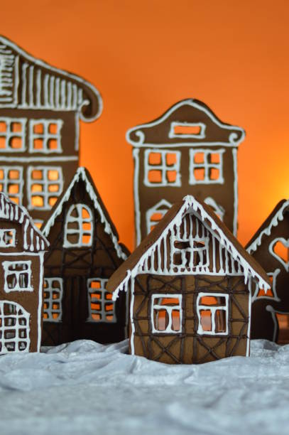 istock home made gingerbread village with orange background 1177020303