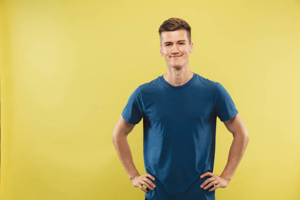 istock Caucasian young man's half-length portrait on yellow background 1177020551