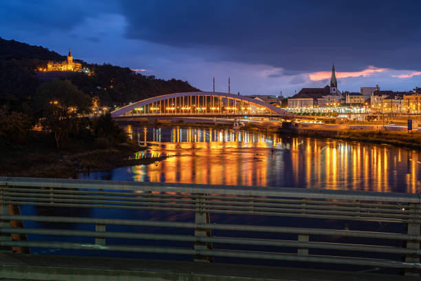 Night city scene with bridge, river reflection and nice view point. Usti nad Labem in Czech Republic. Aussig.
