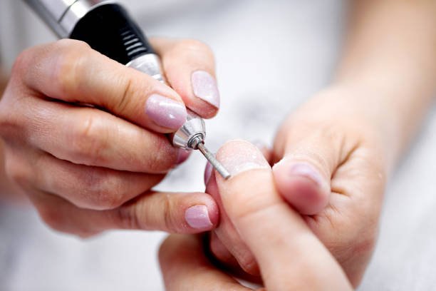 istock Grooming of nails with electric machine 1177022069