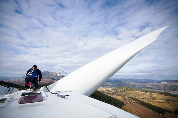 Working upon wind turbine stock photo