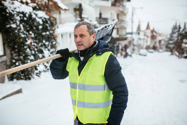 istock Man After Shoveling Parking Lot 1177023472