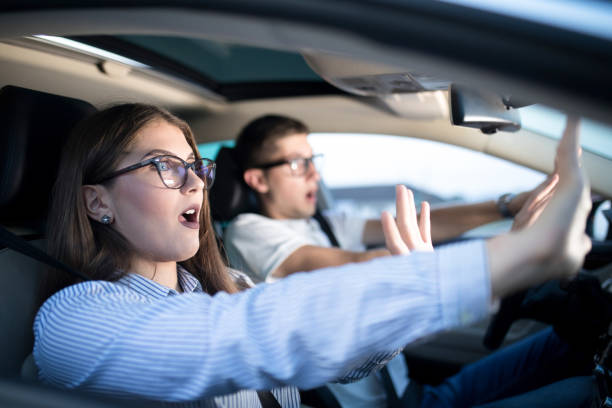 istock Terrified young couple in car crash 1177024138