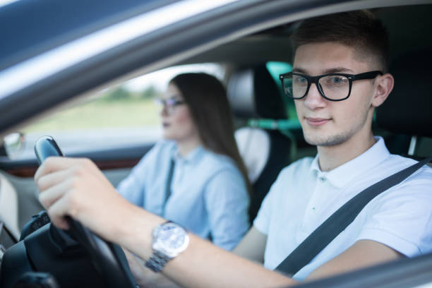 istock Young couple traveling in car 1177025370