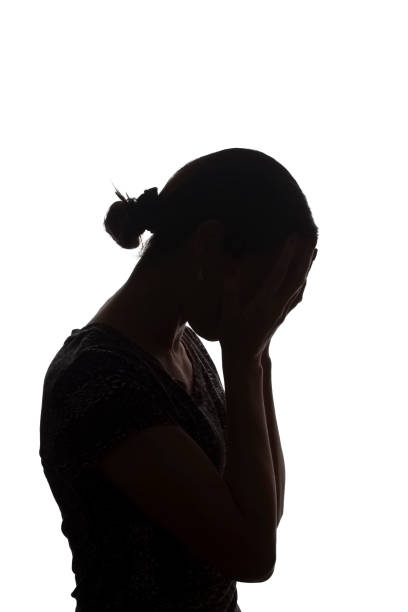 istock Silhouette young girl with problems, hands on her head - isolated 1177028064