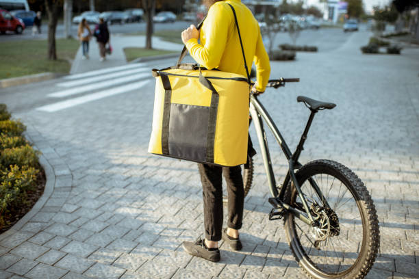 istock Man delivering food in thermo bag 1177031826