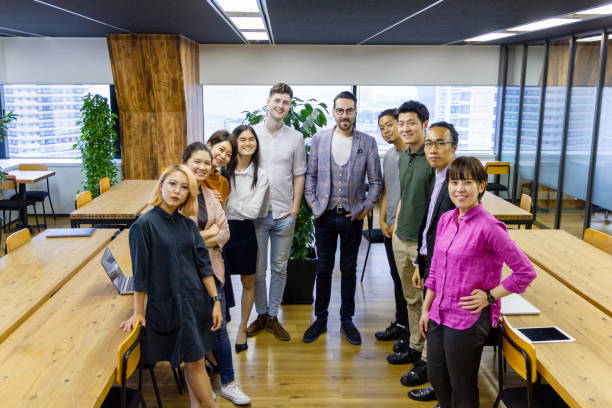istock Group of business people in modern office 1177032627
