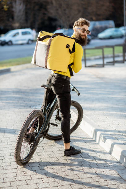 istock Courier delivering food on a bicycle 1177033296