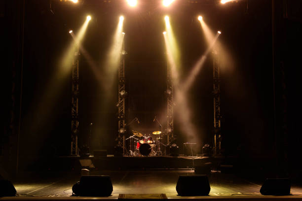 istock Lights beams on stage with musical instruments 1177033392