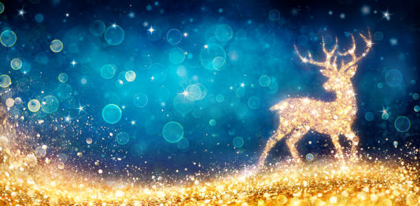 boże narodzenie - magiczne złote jelenie w błyszczącym niebieskim tle - reindeer christmas decoration gold photography zdjęcia i obrazy z banku zdjęć