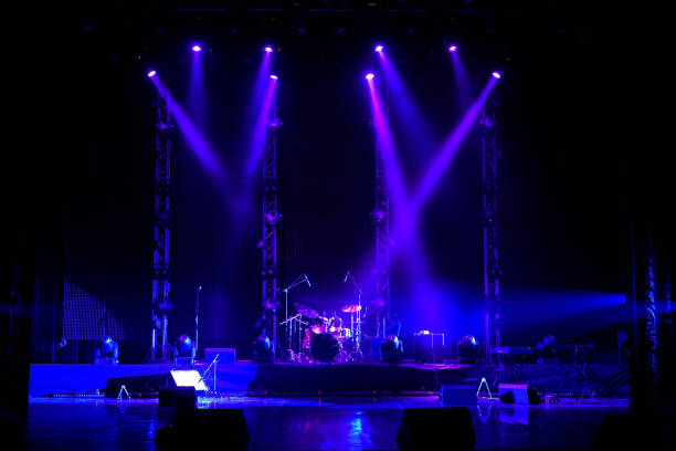 istock Lights beams on stage with musical instruments 1177033566