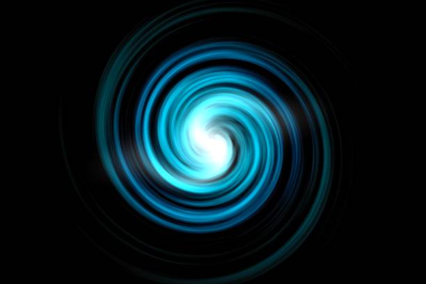 istock Abstract blue spiral clouds with light effect on black sky background 1177033623