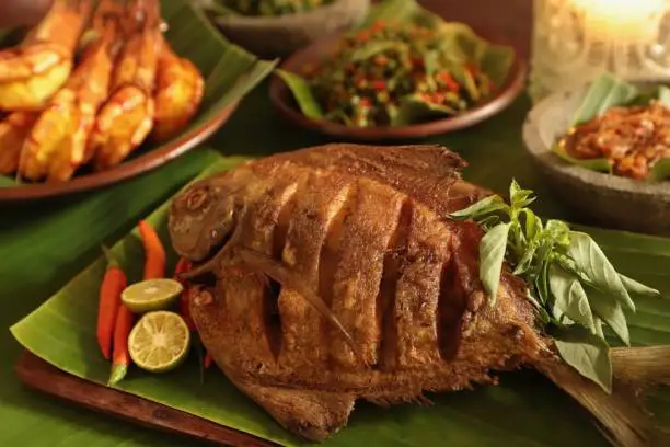 Photo of Ikan Goreng, a Popular Indonesian Seafood Dish of Fried Whole Fish