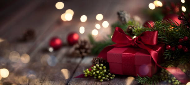 christmas gift on old wood background - wreath christmas bow holiday imagens e fotografias de stock