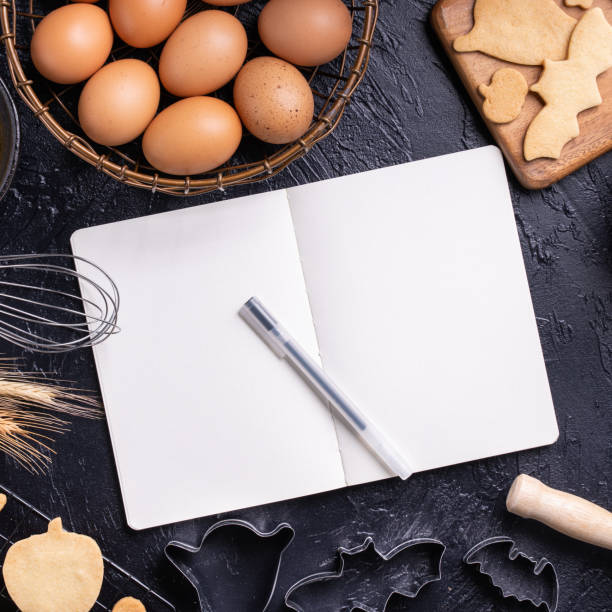 istock Making cookies cookbook recipe design concept, baking ingredients preparation layout with notebook. 1177037052