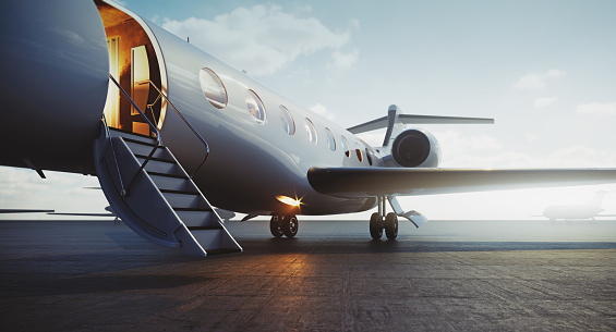 Closeup view of business jet airplane parked at outside and waiting vip persons. Luxury tourism and business travel transportation concept. 3d rendering.