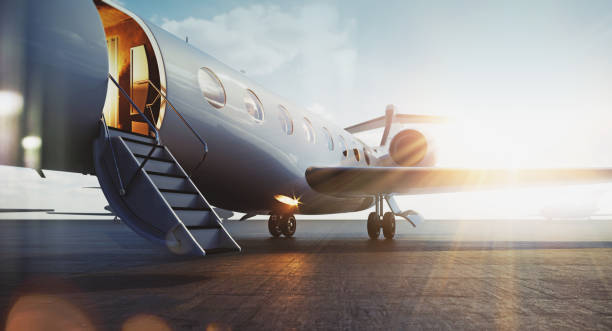 Business jet airplane parked at outside and waiting vip persons. Luxury tourism and business travel transportation concept. Flares. 3d rendering. Business jet airplane parked at outside and waiting vip persons. Luxury tourism and business travel transportation concept. Flares. 3d rendering first class stock pictures, royalty-free photos & images