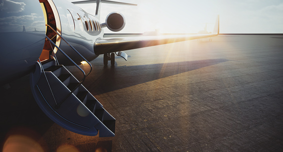 Closeup view of business jet airplane parked at outside and waiting vip persons. Luxury tourism and business travel transportation concept. Flares. 3d rendering