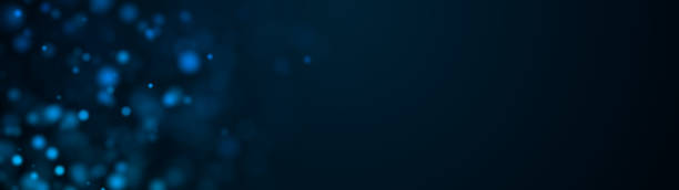 istock Computer generated many of blue spots big and small with bokeh on a black background. Widescreen 3d rendering 1177037903