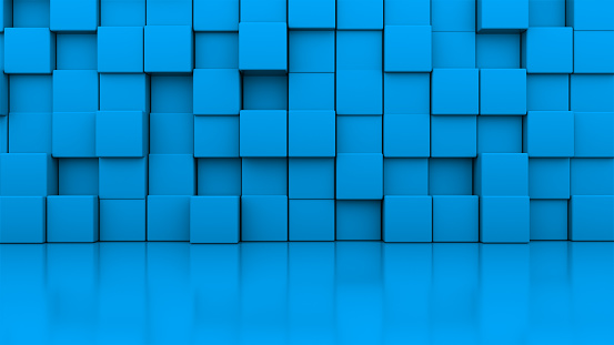 3d rendering wall of many blue cubes located at different levels in a blue studio. Computer generated abstract background.