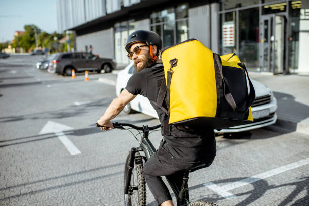 istock Courier delivering food on a bicycle 1177039157