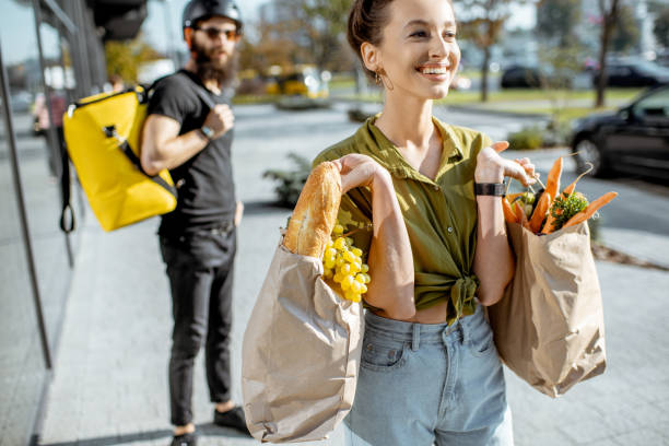 istock Woman with fresh products received from a courier 1177039176