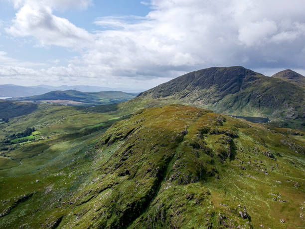 istock Aerial View of Mountain tops with Green Fields 1177043440