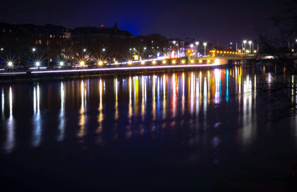 istock Reflection of bright lights in the river at night. 1177043604