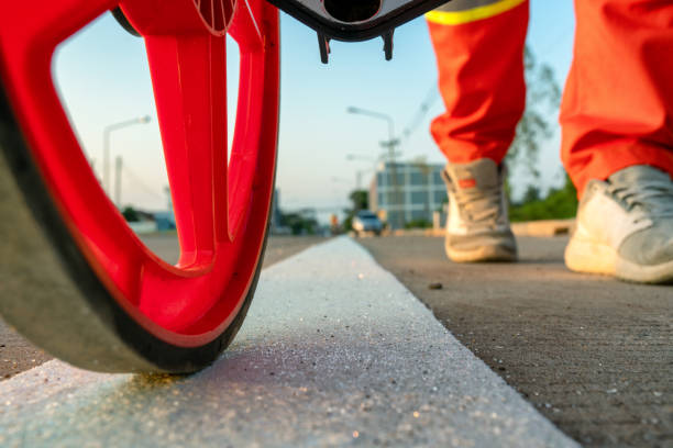 istock Close up measuring road distances with a measuring wheel 1177043769
