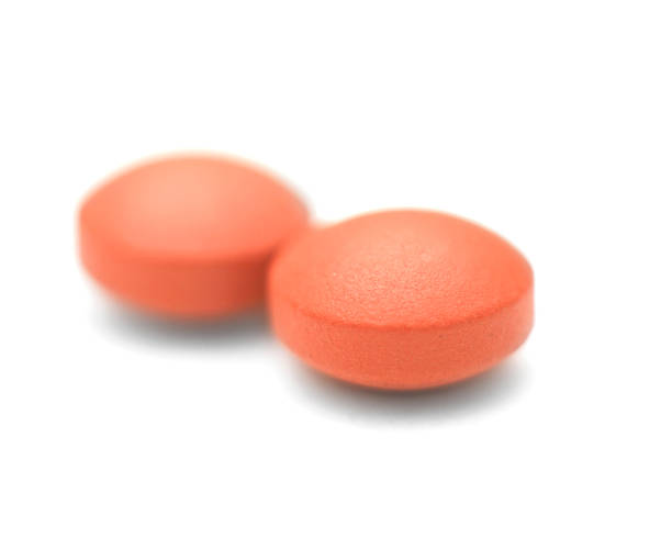 istock Ibuprofen Closeup Photo - Isolated on a White Background 117704420