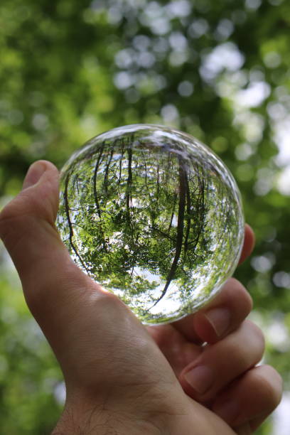 istock Glass crystal ball in hand 1177045314