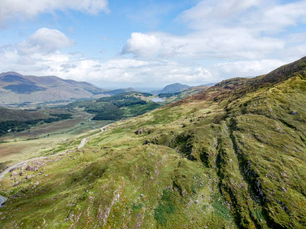 istock Aerial View of Mountain tops with Green Fields 1177045361