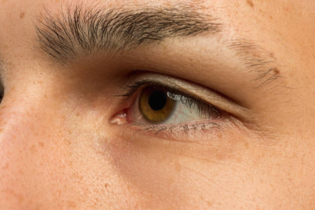 istock Caucasian young man's close up shot on blue background 1177045478