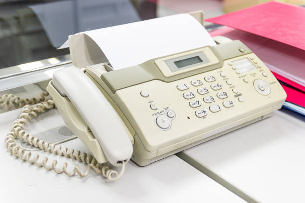 istock The fax machine for Sending documents in the office concept equipment 1177049341