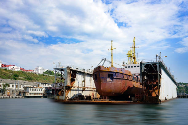 istock Seascape with floating dock on city landscape background. 1177052145