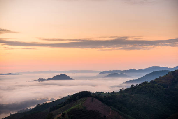 istock Sunrise and the mist in winter morning 1177053204