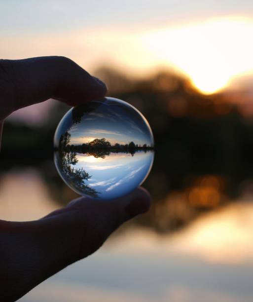 istock Glass ball in hand 1177054641