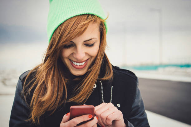 istock Happy woman using phone 1177056244