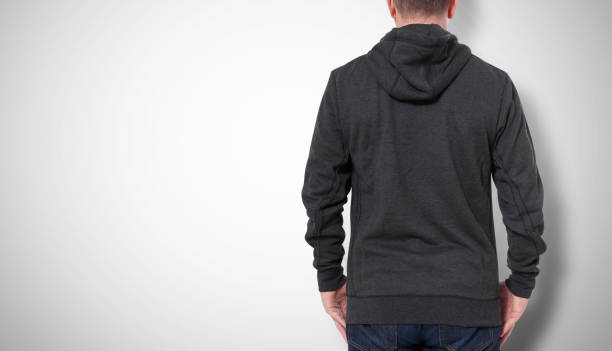 istock Man in black sweatshirt, black hoodies rear view. grey background 1177058413