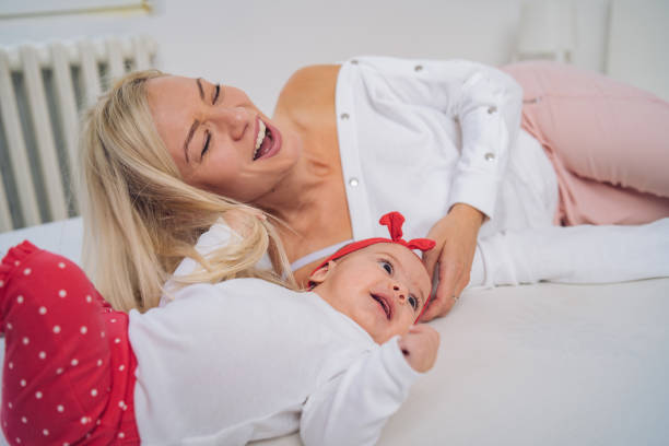 Cute girl with her newborn sister