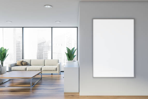 istock White office waiting room with vertical poster 1177059410