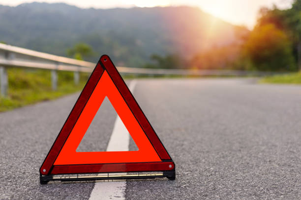 istock Red triangle, red emergency stop sign, red emergency symbol on road. With copy space for text or design 1177060921