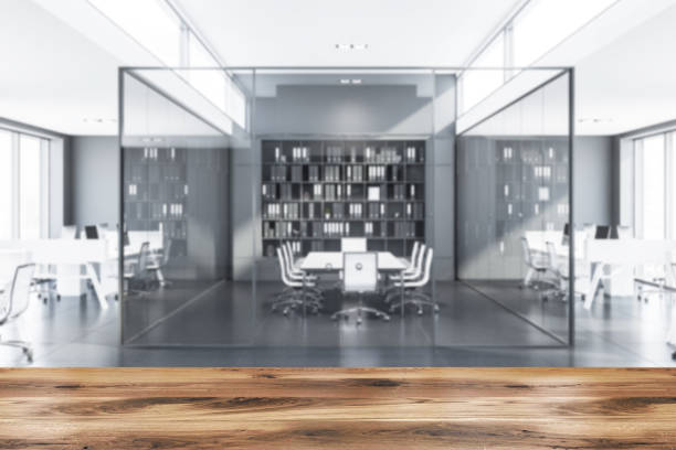 istock Blurred gray meeting room background with table 1177061251