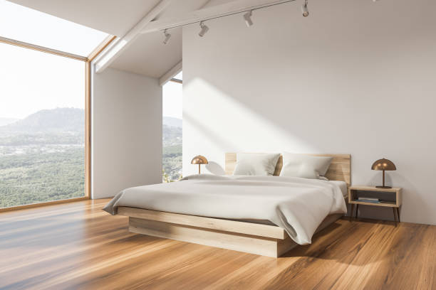 istock Stylish white attic bedroom corner 1177062993