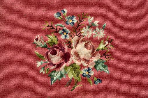 Old needlepoint roses.