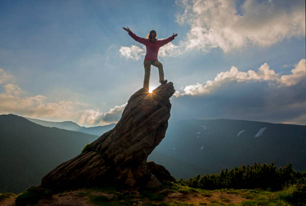 istock Woman on rock 1177063512