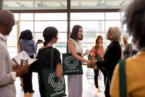 istock Attendees wait in line to shake hands with expo speaker 1177065316