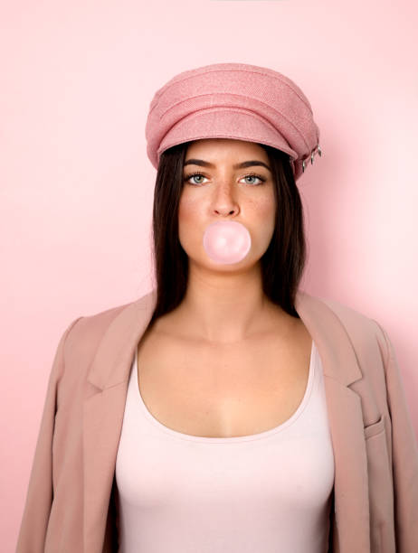 istock Brunette woman blowing bubble gum 1177066400