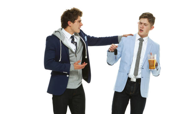 istock Two people in front of white background 1177067235